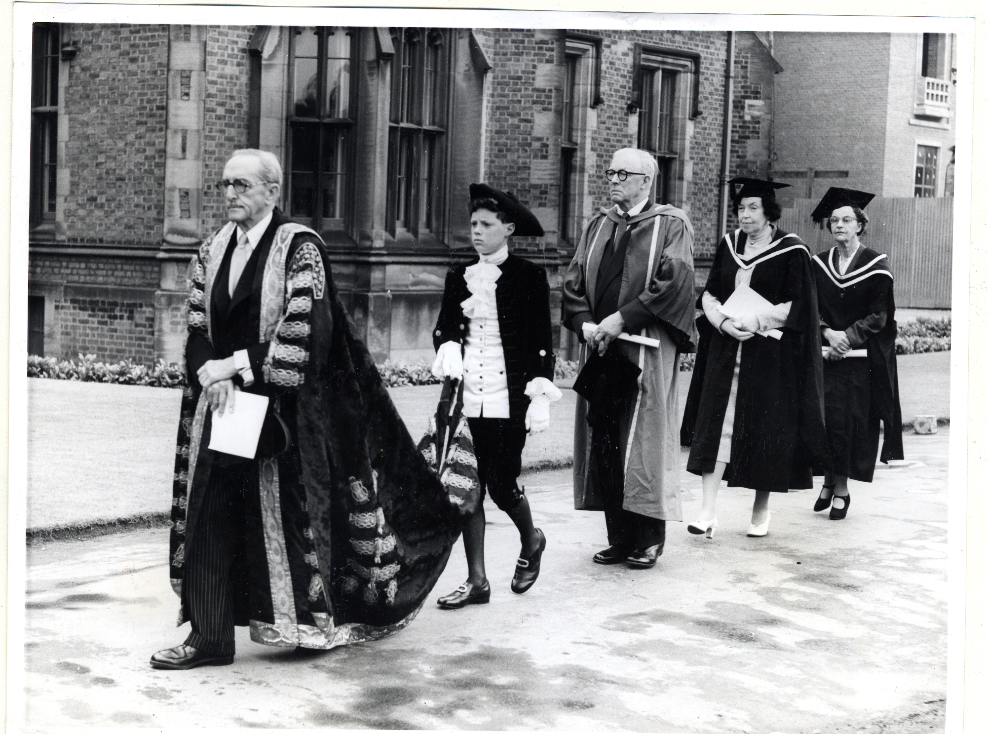 Olive Baguely (4th from the left) receives an honorary degree from QUB in 1960.